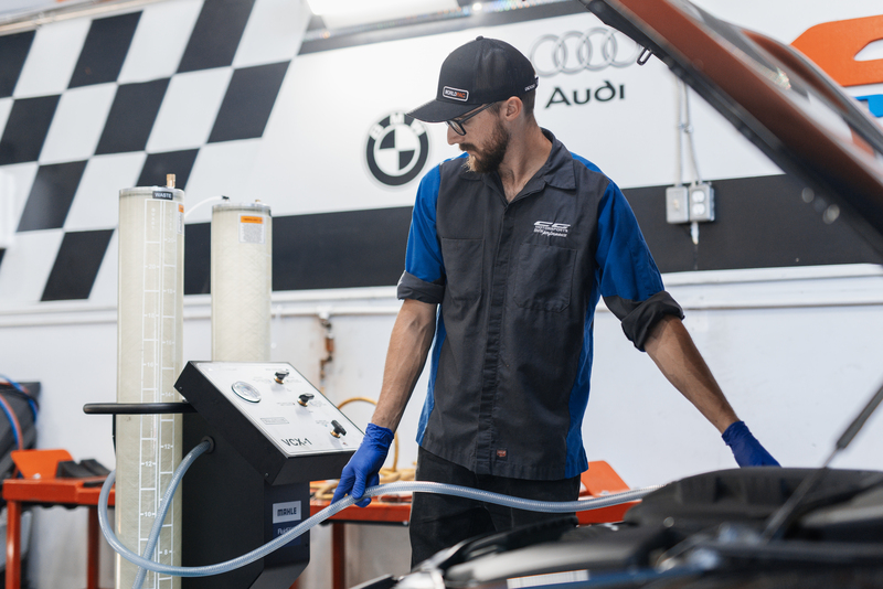 CG Motorsports Techincian servicing a Diesel BMW