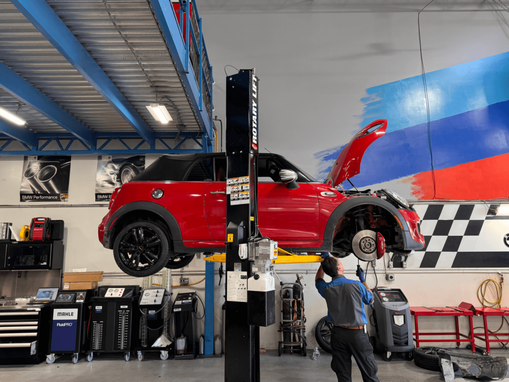 Red BMW Mini in the Shop For Maintenance at CG Motorsports