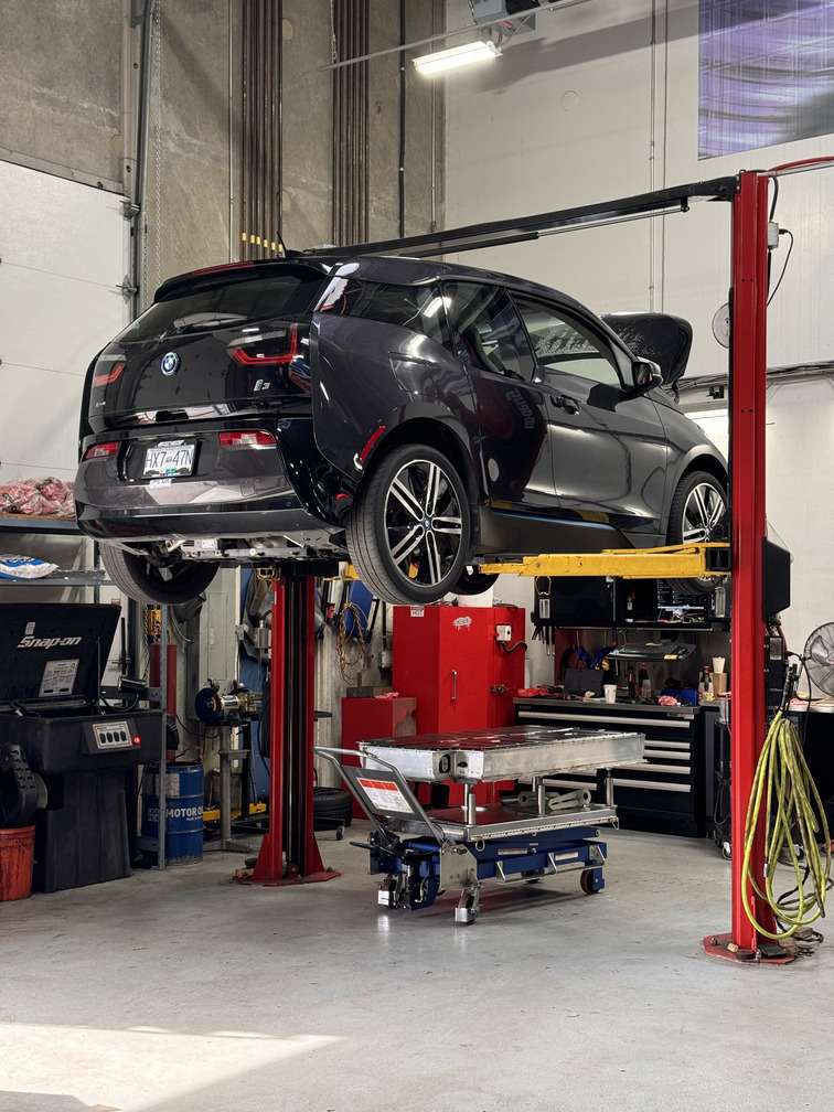 BMW i3 Electric Car in the shop for maintenance at CG Motorsports